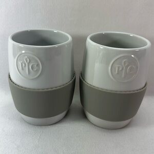 Pampered Chef White Ceramic Mugs with Gray Silicone Grip - Set of 2